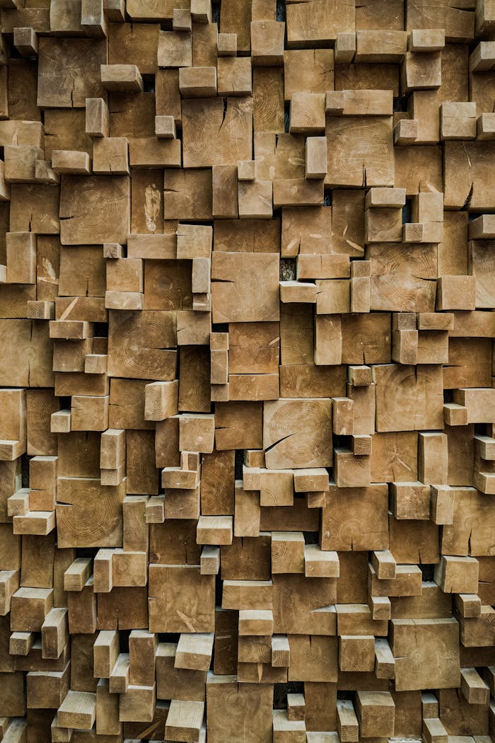 Intricate 3D abstract pattern of wooden blocks stacked for decorative wall texture.